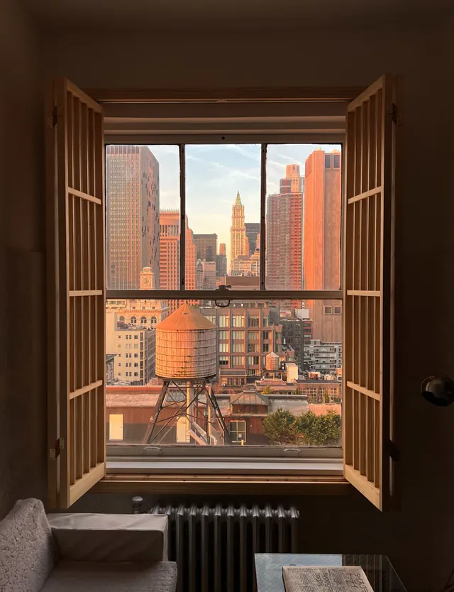 Cityscape View Through a Window, photographic, minimal, warm
