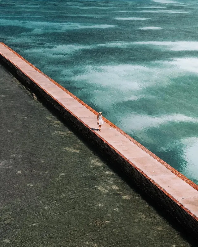 Coastal Edge with Miniature Figure, photographic, minimal, cool