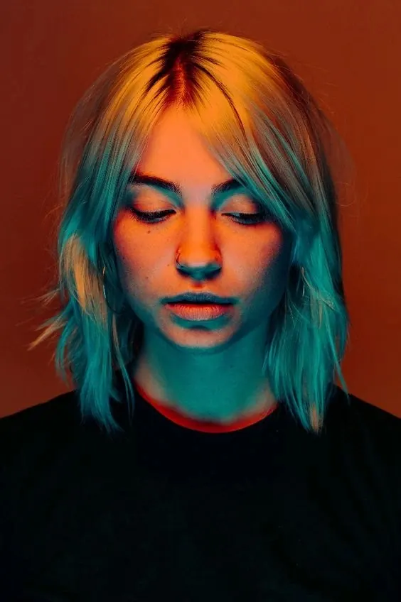 Stylized Portrait with Neon Accents, photographic, abstract, vibrant