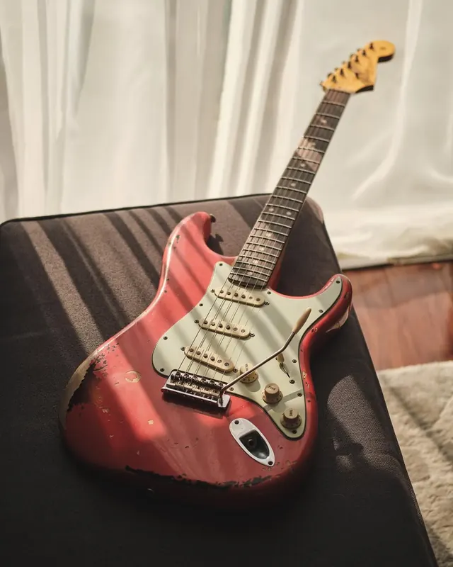 Red Electric Guitar on Stand, photographic, vibrant