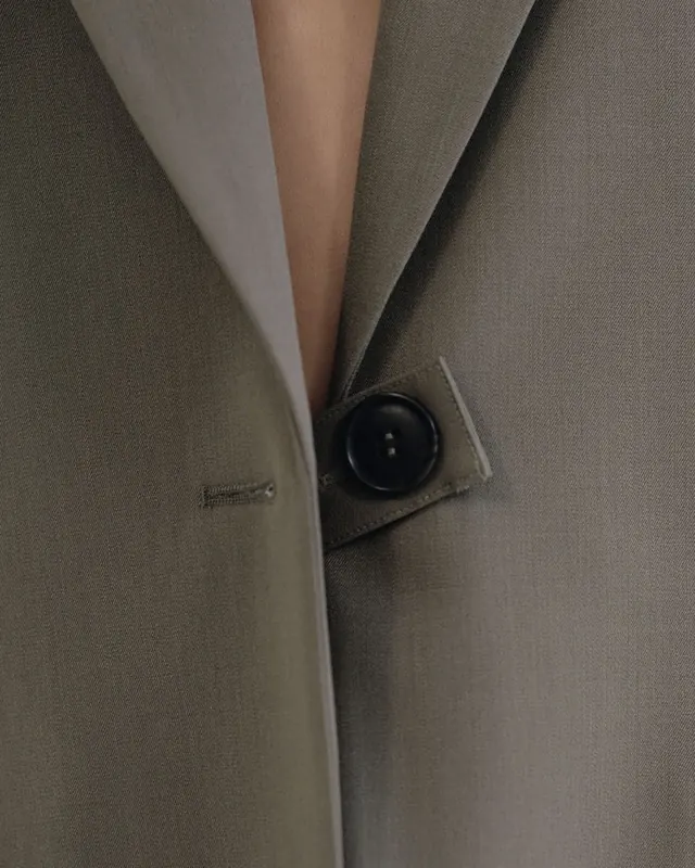 Close-up of a Grey Suit Jacket, minimal, luxury, muted