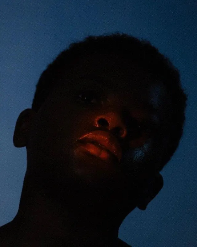 Close-up Portrait of a Person, photographic, dark-mode, dark
