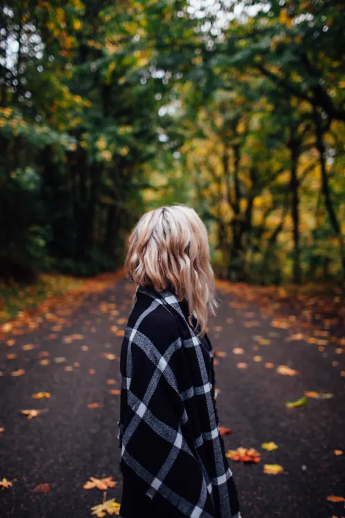 Woman in Plaid Coat in Autumn Forest, photographic, organic, earthy
