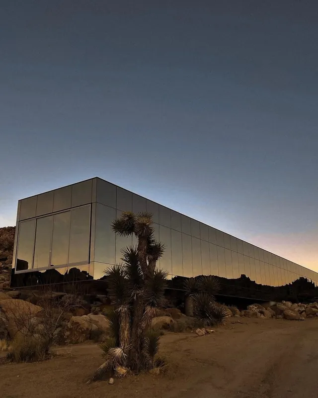 Modernist Glass Architecture in Desert, minimal, photographic, muted