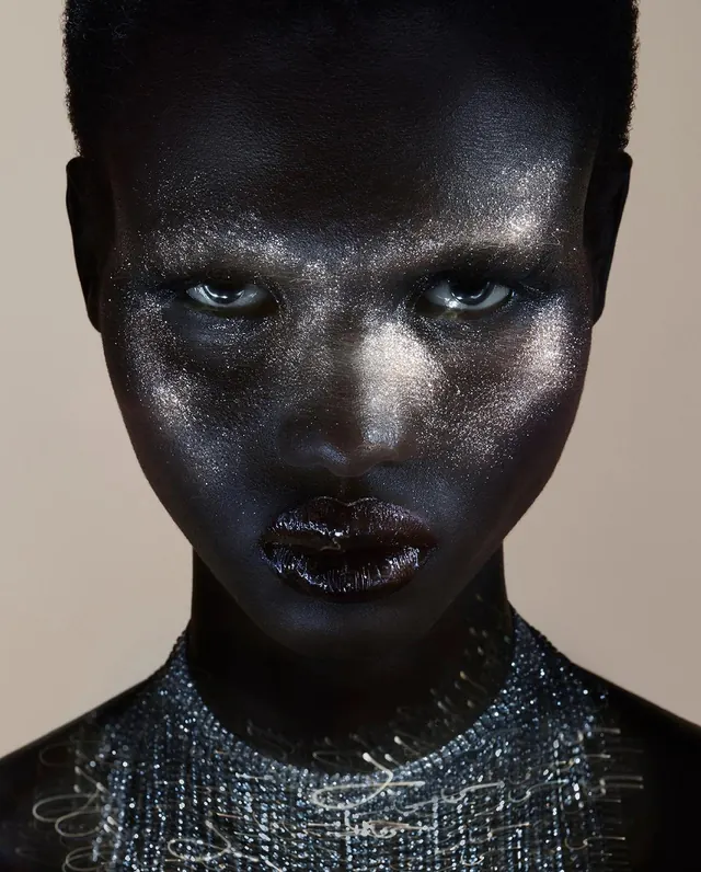 Close-up Portrait of a Person with Metallic Texture, photographic, luxury, dark