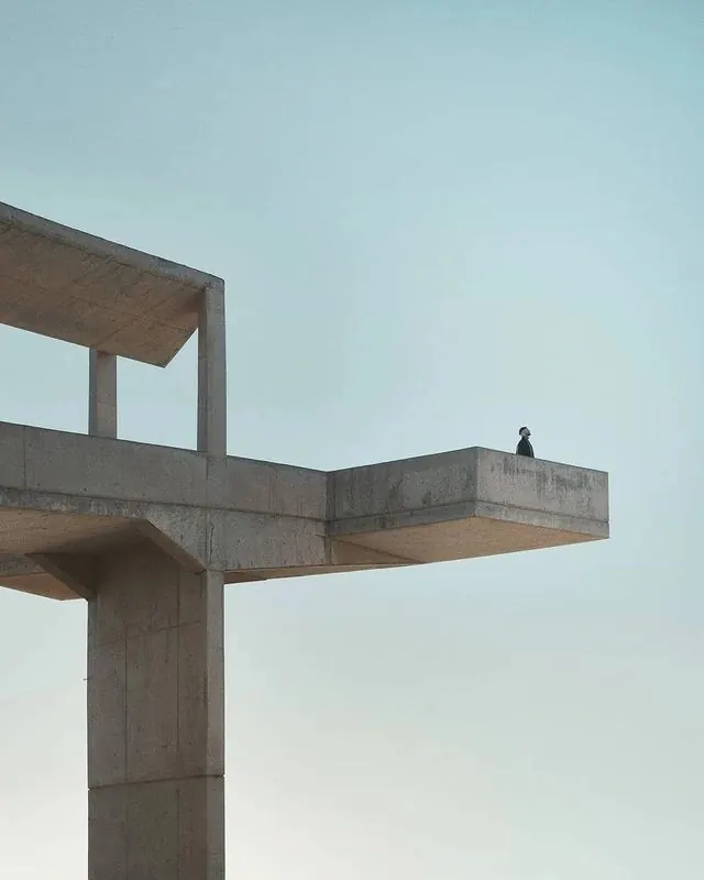 Minimalist Concrete Architecture with Human Figure, minimal, brutalist, monochrome