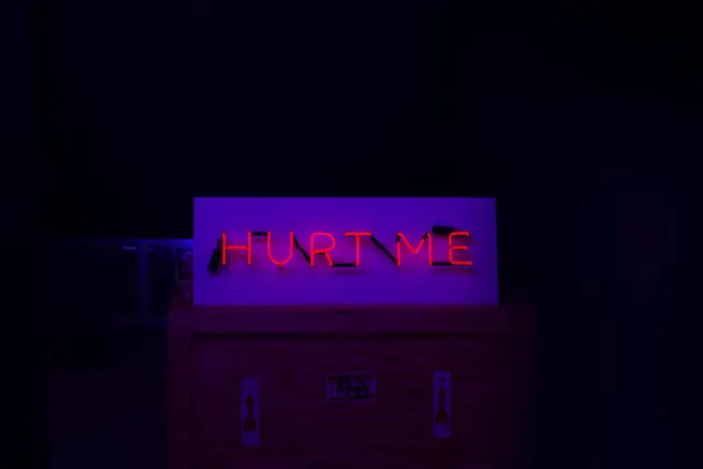 Neon 'HURT ME' Sign Mockup, dark-mode, brutalist, dark