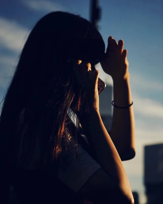Silhouette of a Woman with Sunglasses, photographic, dark-mode, dark