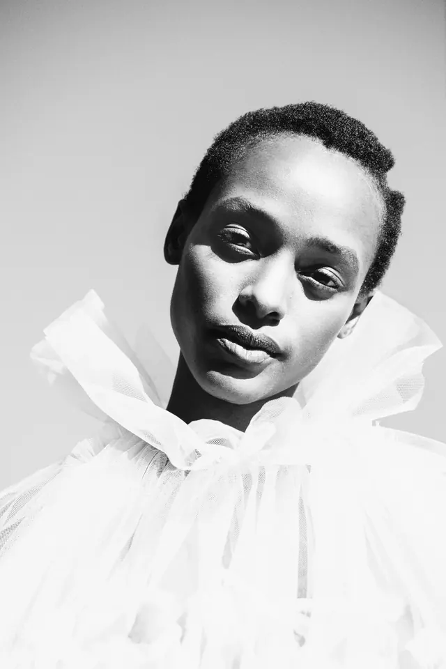 Monochrome Portrait of a Woman in Ruffled Clothing, minimal, monochrome, monochrome
