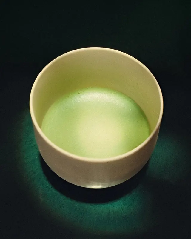 Green Liquid in a Ceramic Bowl, minimal, organic, dark