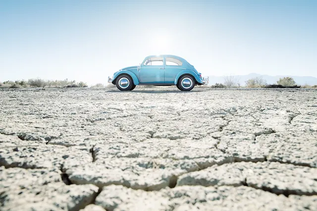 Blue Car in Salt Flat, minimal, photographic, light