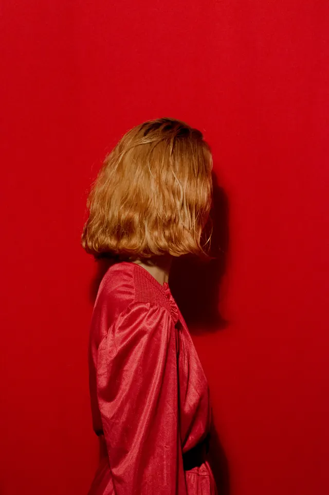Red Background Portrait, minimal, photographic, vibrant