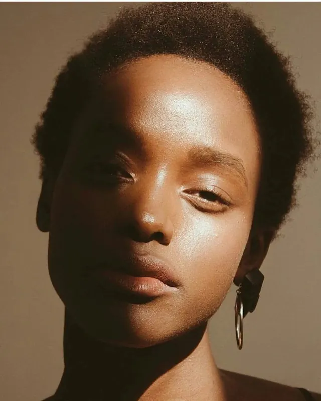 Portrait of a Person with Earring, photographic, organic, warm
