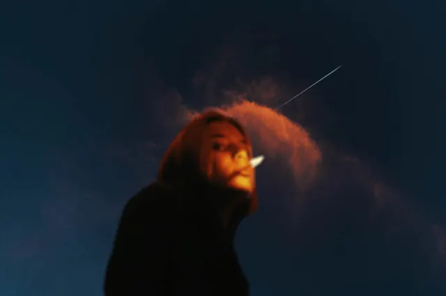 Woman with Glowing Aura and Shooting Star, photographic, abstract, dark