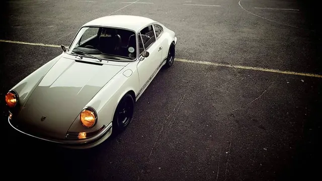 Vintage Porsche 911 on Asphalt, photographic, minimal, high-contrast