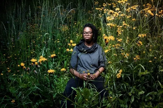 Woman in a Field of Yellow Flowers, photographic, organic, earthy