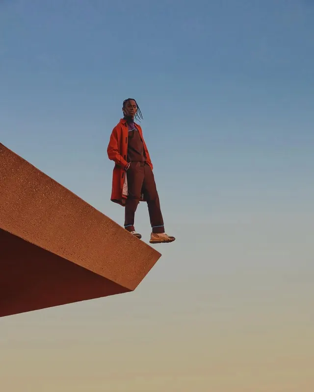 Man Standing on Architectural Edge, minimal, photographic, vibrant