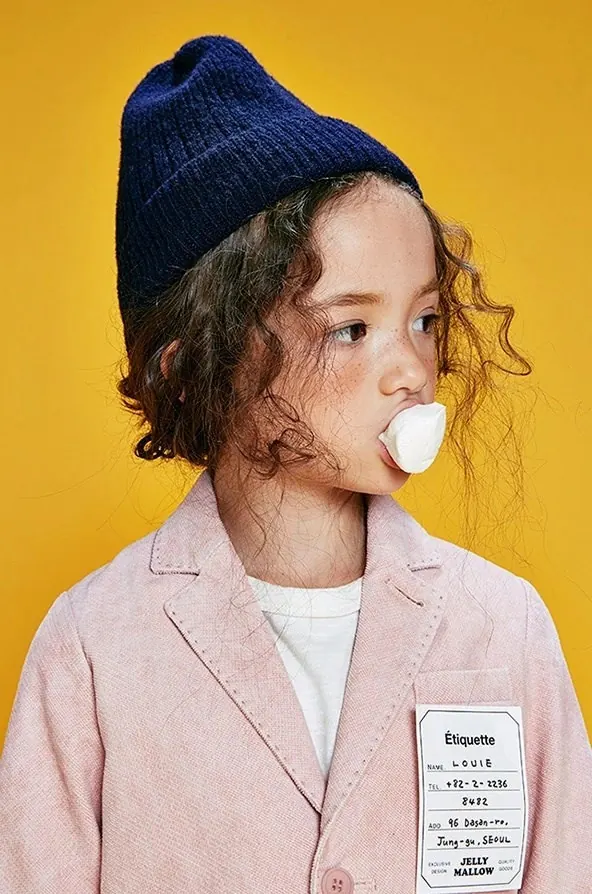 Portrait of a Woman with a Beanie and Label, photographic, playful, vibrant