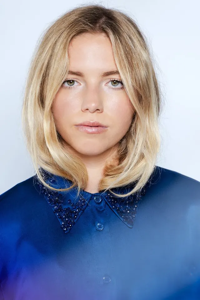 Portrait of a Woman in Blue Dress, photographic, organic, vibrant