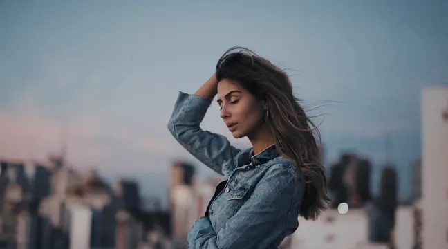 Woman in Denim with Cityscape Background, photographic, organic, muted