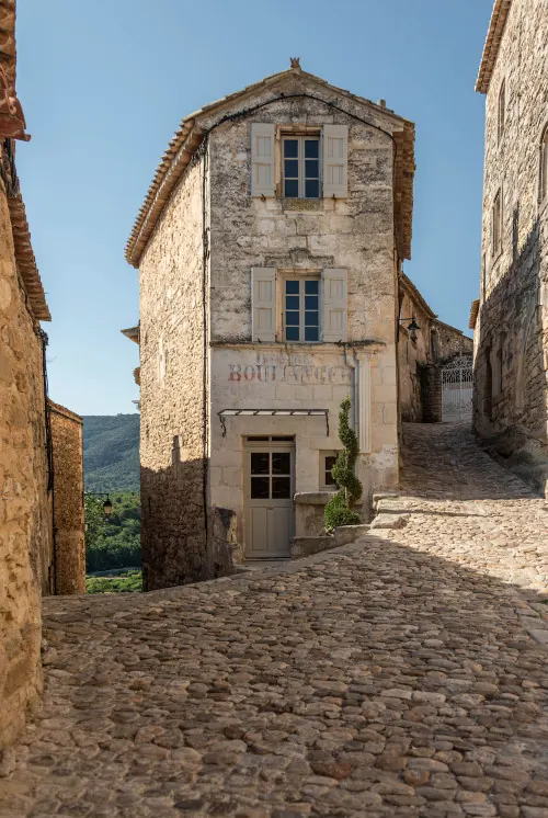 Old European Building with Signage, photographic, organic, warm