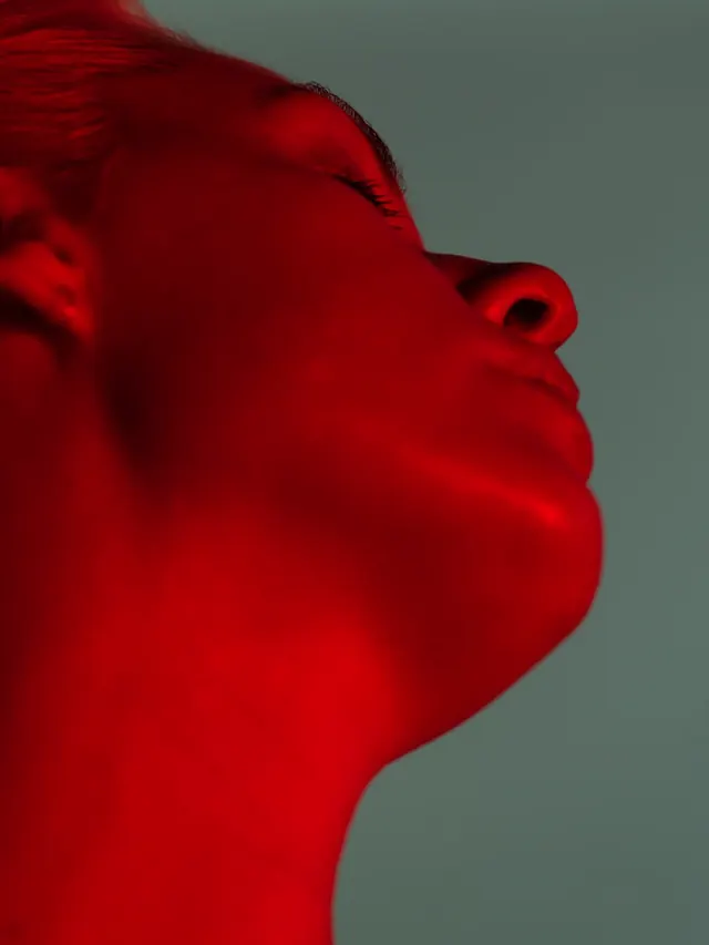 Red Profile Portrait, photographic, minimal, vibrant