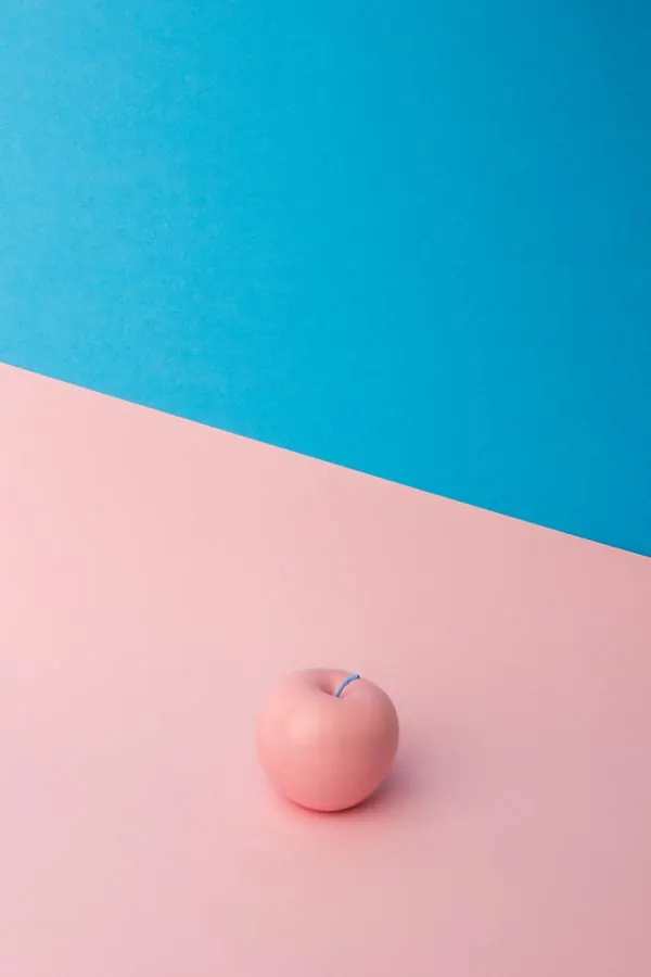 Minimalist Pink Apple on Split Background, minimal, flat, pastel