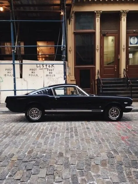 Classic Black Car in Urban Setting, photographic, luxury, dark