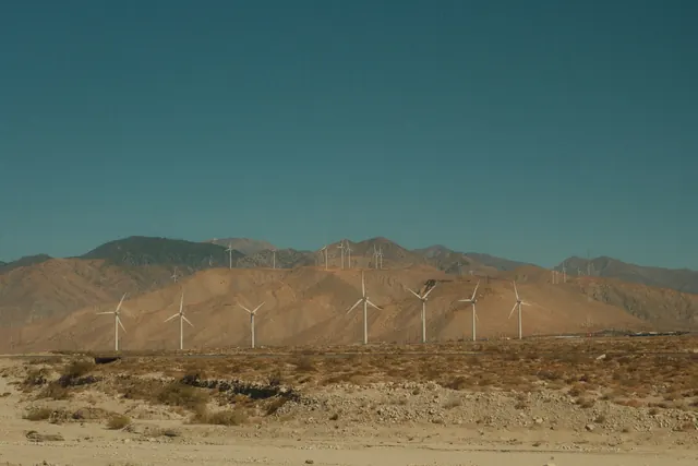 Wind Turbines in Desert Landscape, photographic, minimal, earthy