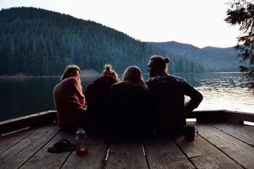 Group of Friends on a Dock, photographic, organic, dark