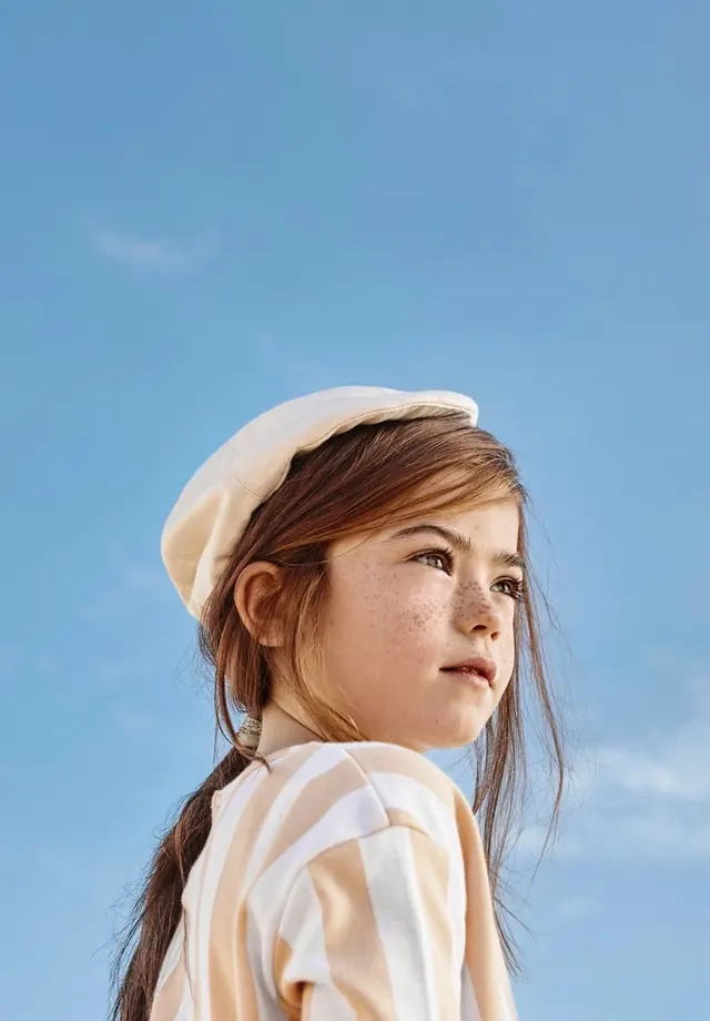 Portrait of a Woman in a White Beret, photographic, minimal, light