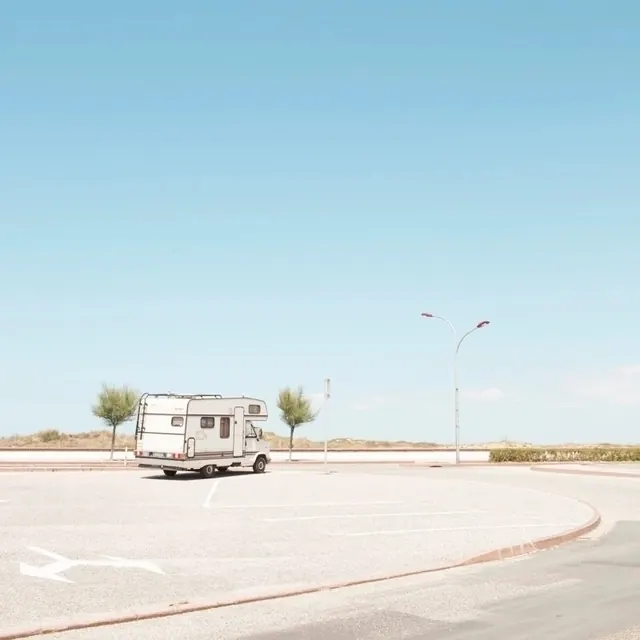 Vintage Camper in Desert Landscape, minimal, photographic, light