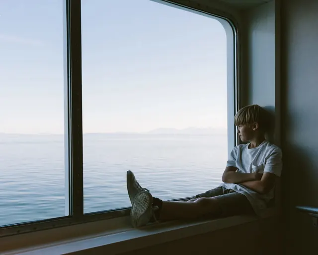 Person Looking Out at the Ocean, minimal, photographic, muted