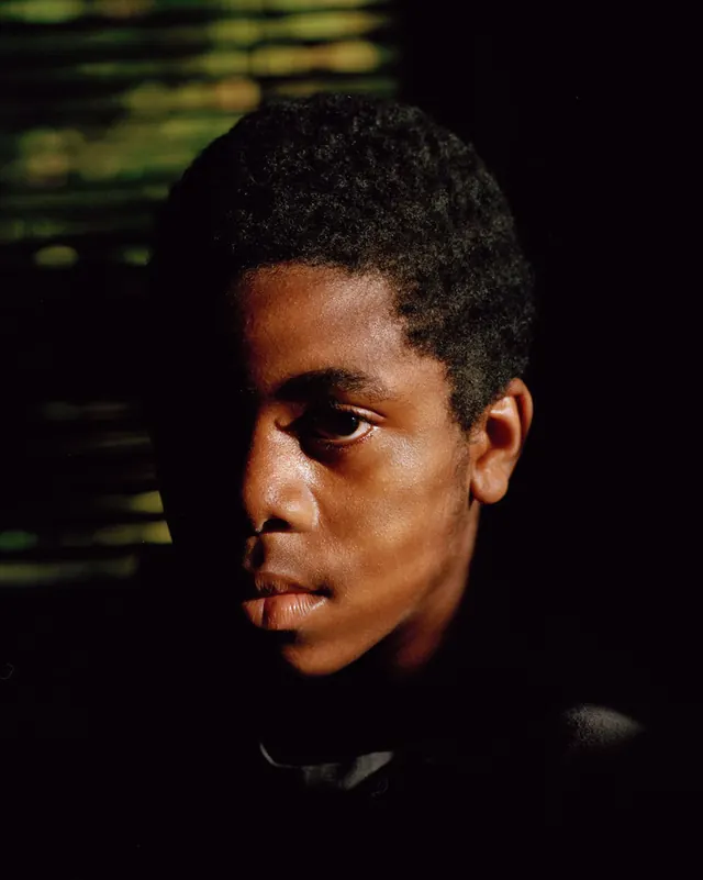 Portrait of a Young Man, photographic, dark-mode, dark