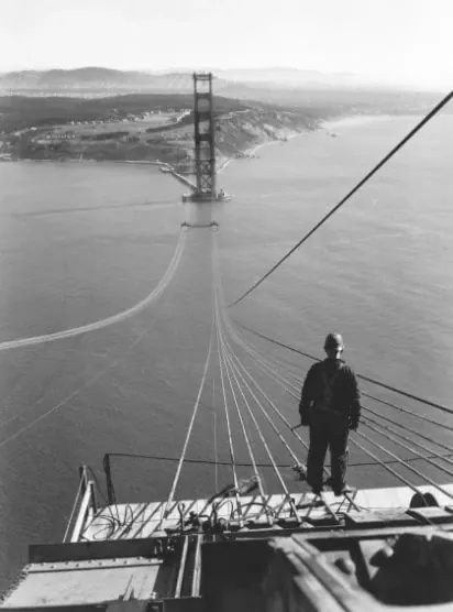Person on Suspension Bridge, monochrome, photographic, monochrome