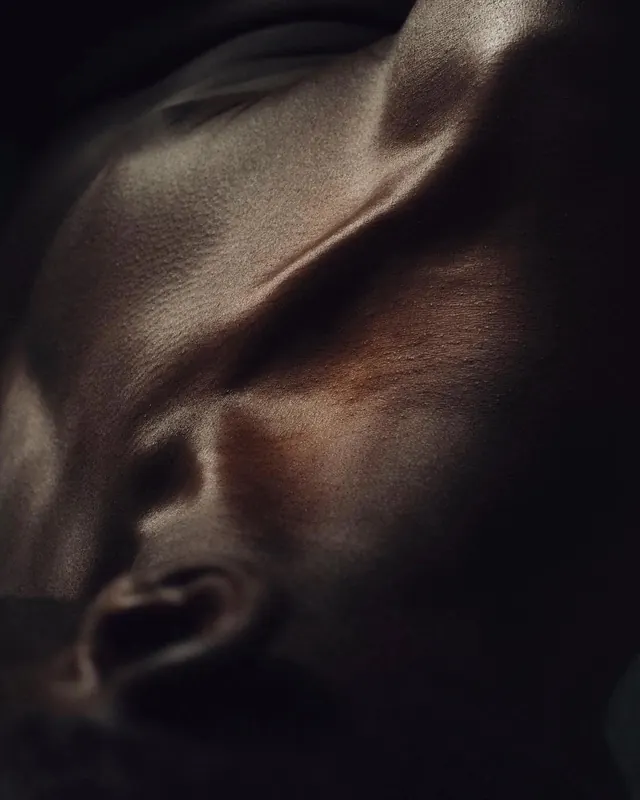Close-up Portrait of a Face, photographic, dark-mode, dark