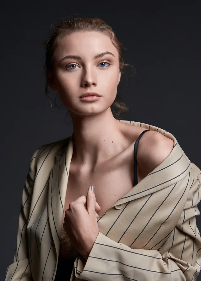 Portrait of a Woman in Striped Clothing, photographic, luxury, dark