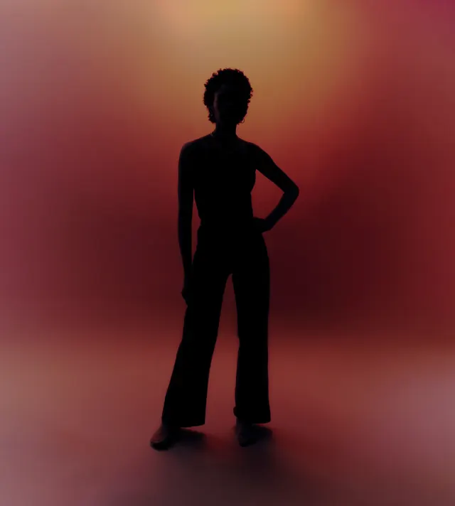 Silhouette Figure in Red Gradient, minimal, photographic, vibrant