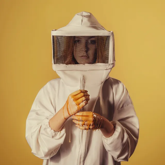 Beekeeper in Protective Gear, photographic, minimal, warm
