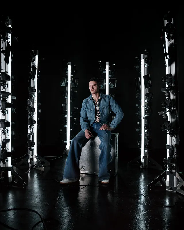 Man in Studio with Stage Lighting, photographic, dark-mode, dark