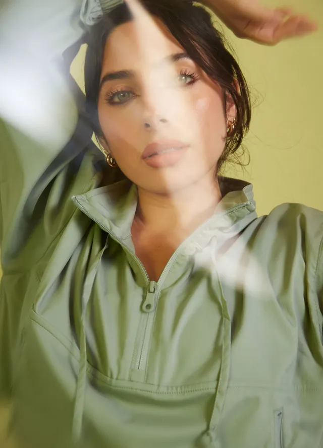 Portrait of a Woman in Green Garment, photographic, organic, muted