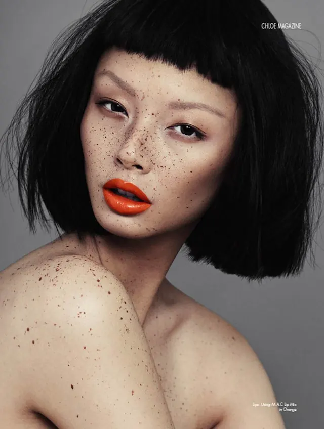 Portrait of a Woman with Freckles, editorial, photographic, monochrome
