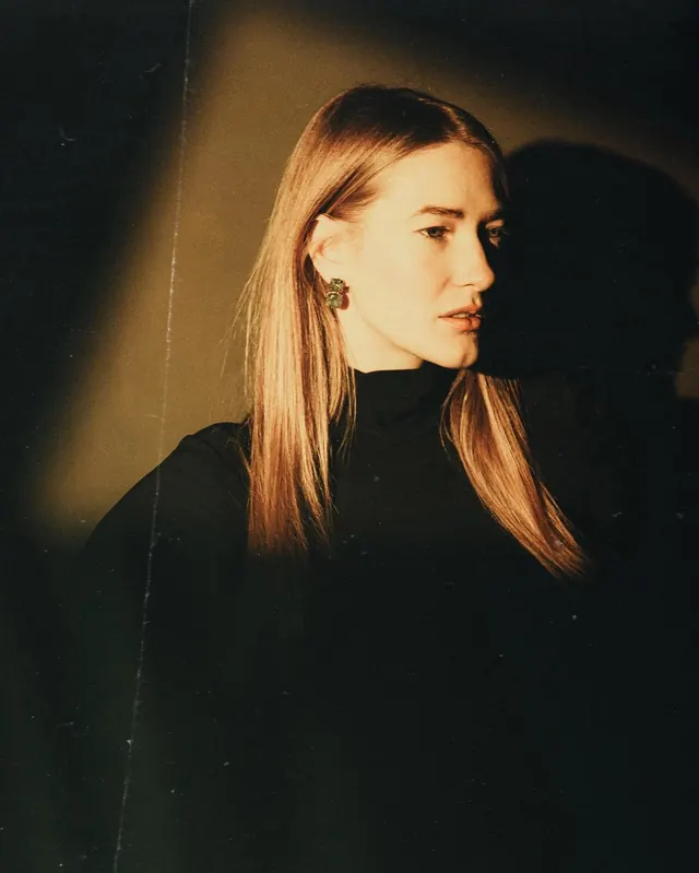 Portrait of a Woman in Shadow, minimal, photographic, dark