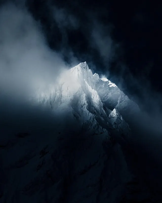 Snowy Mountain Peak in Mist, photographic, minimal, dark