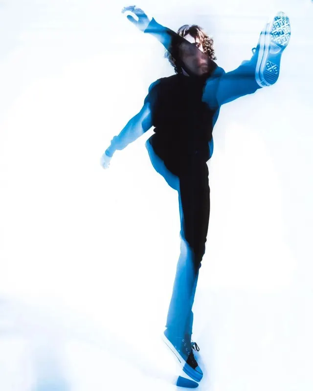 Dynamic Figure in Motion, photographic, minimal, high-contrast