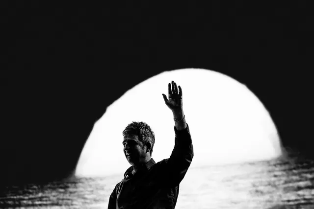Man in Silhouette with Glowing Orb, monochrome, photographic, monochrome