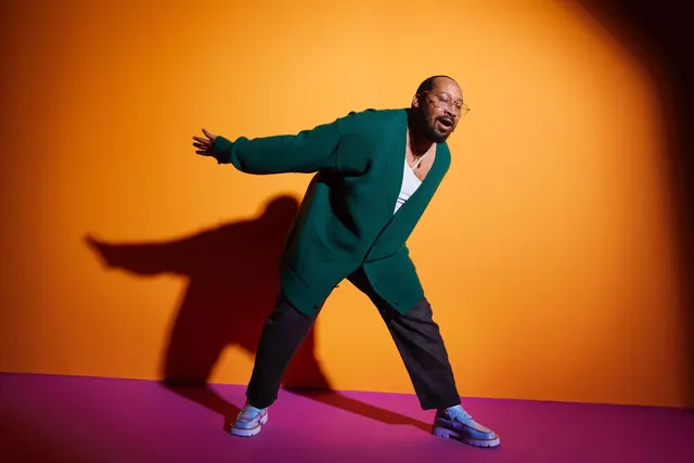 Man in Suit on Vibrant Background, photographic, vibrant
