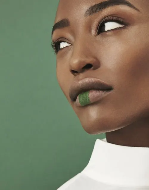 Close-up Portrait of a Woman with Green Lip Gloss, photographic, minimal, muted