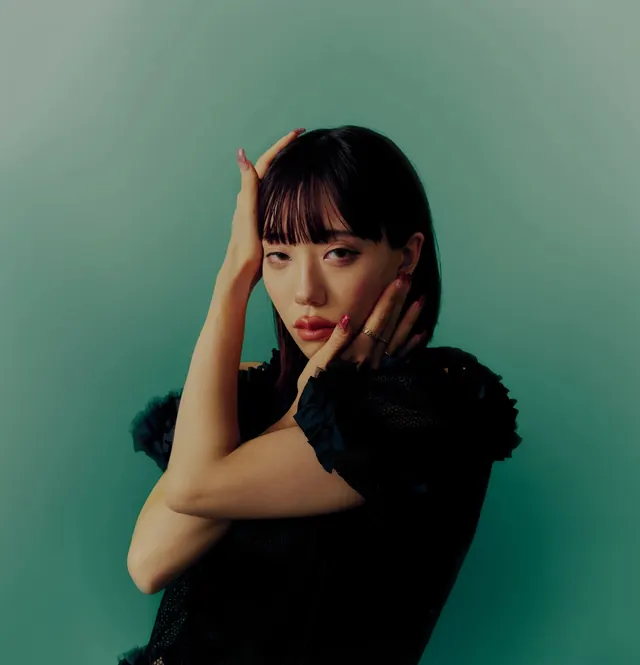 Portrait of a Woman in Black Ruffles, photographic, minimal, vibrant