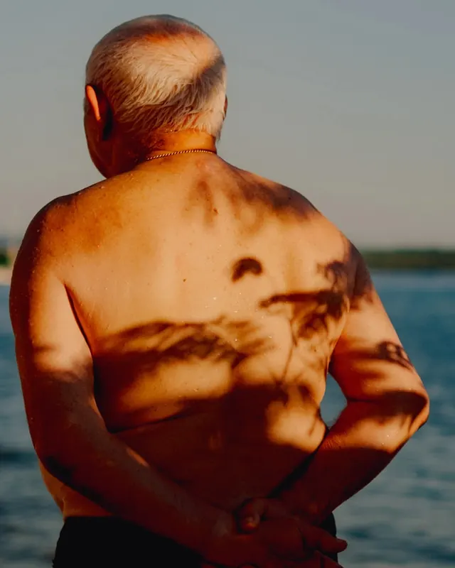 Man with Shadow on Back, photographic, organic, warm